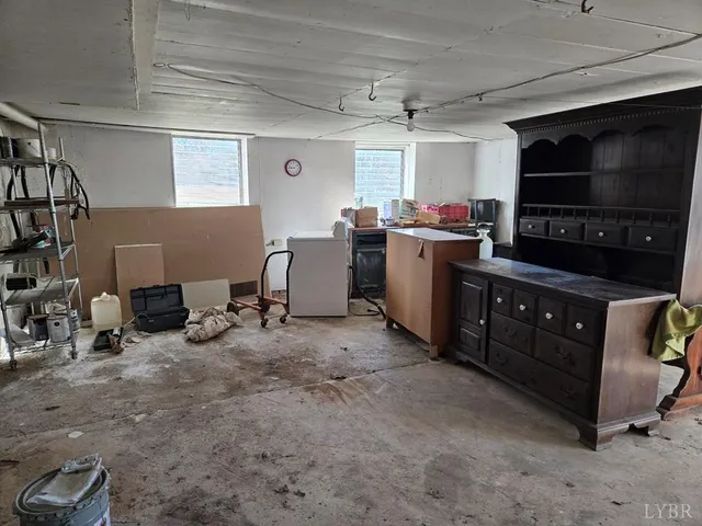 a room with furniture and a flat screen tv