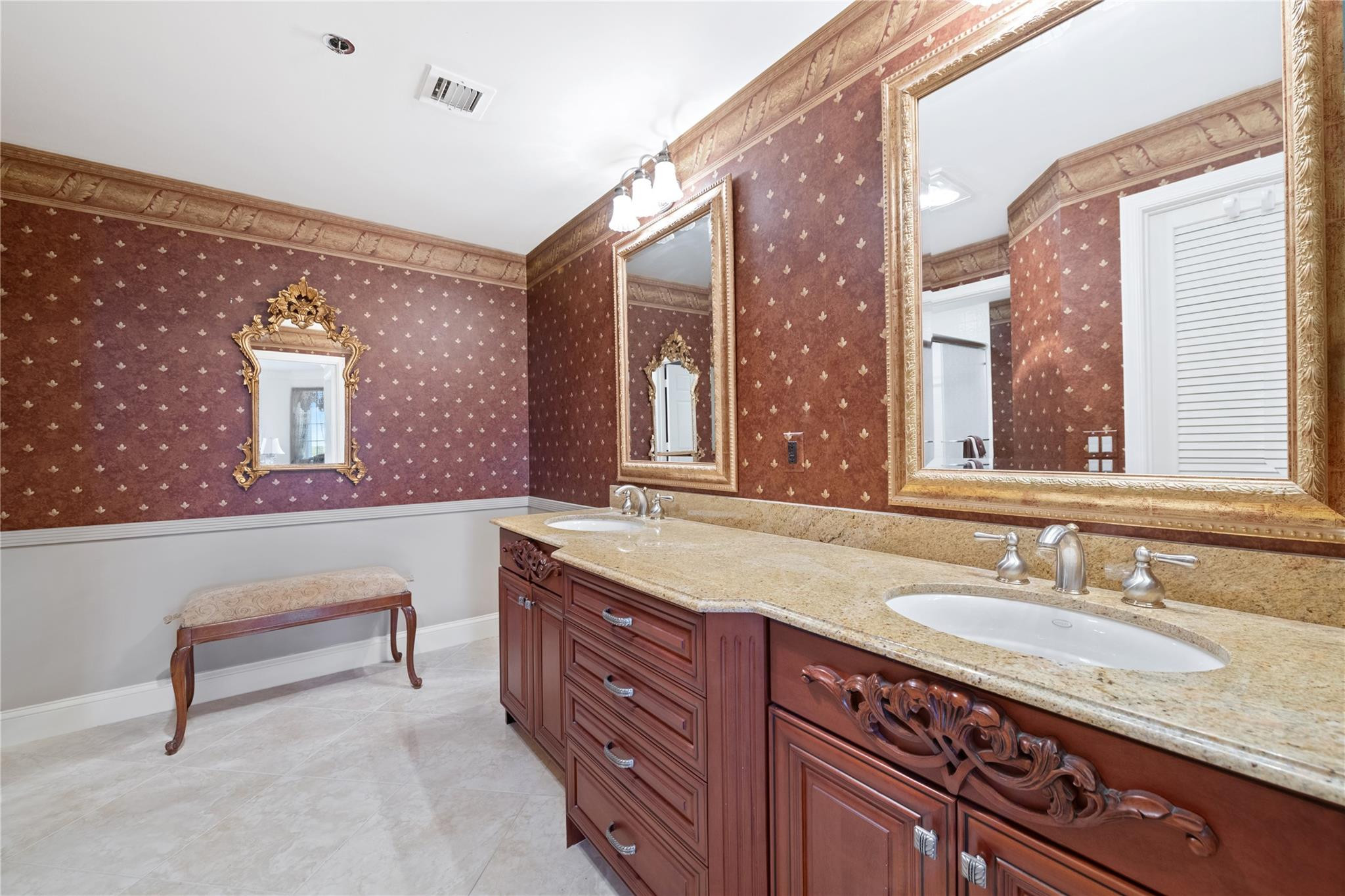 17031 Boca Club Boulevard, Unit 85A Boca Raton, FL 33487 - Photo 15 of 49 a bathroom with a granite countertop sink and a large mirror