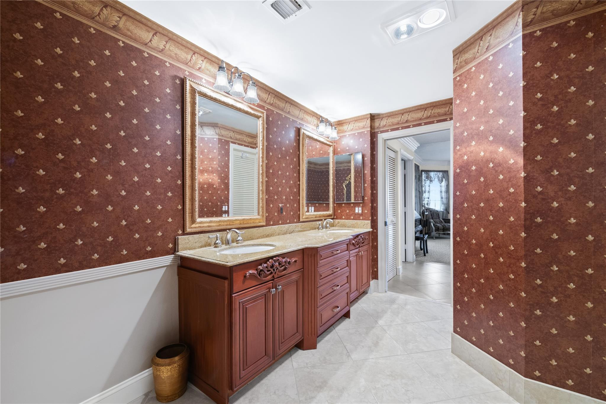 17031 Boca Club Boulevard, Unit 85A Boca Raton, FL 33487 - Photo 16 of 49 a bathroom with a sink and a mirror