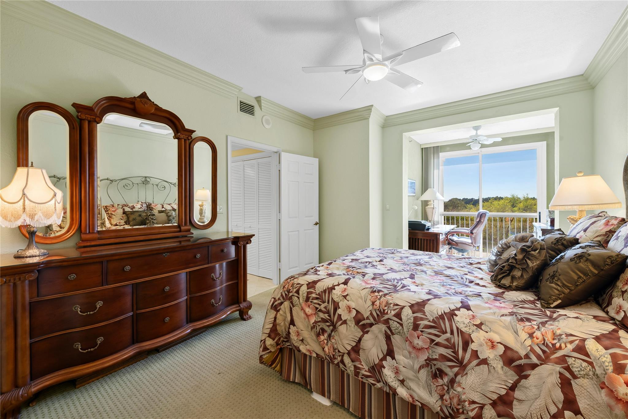 17031 Boca Club Boulevard, Unit 85A Boca Raton, FL 33487 - Photo 20 of 49 a bedroom with a bed and a dresser