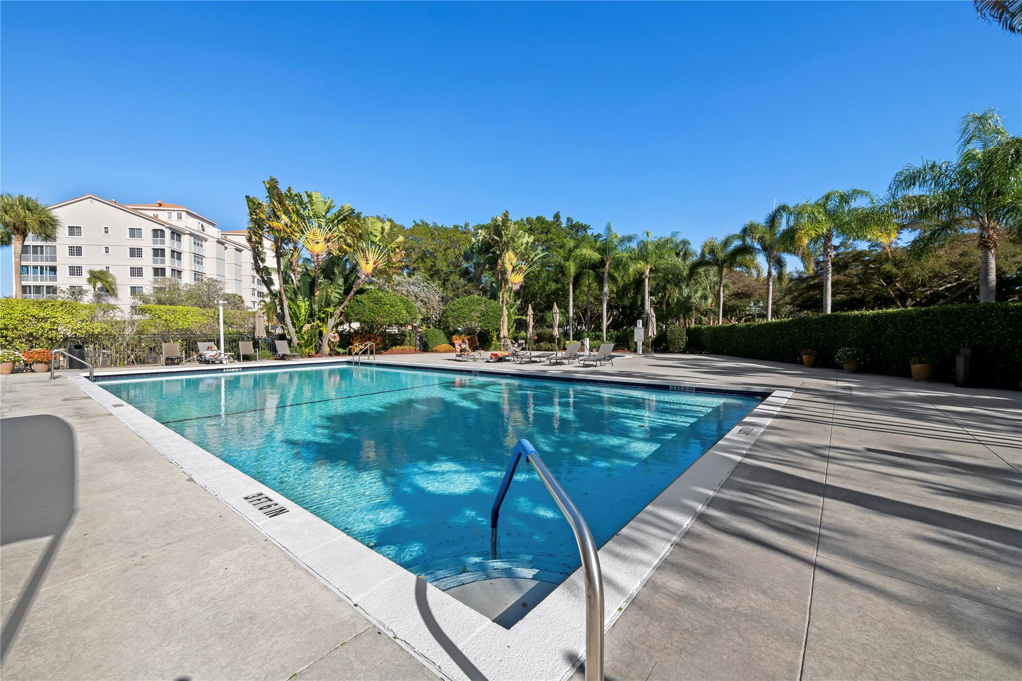 17031 Boca Club Boulevard, Unit 85A Boca Raton, FL 33487 - Photo 2 of 49 a view of swimming pool with a yard