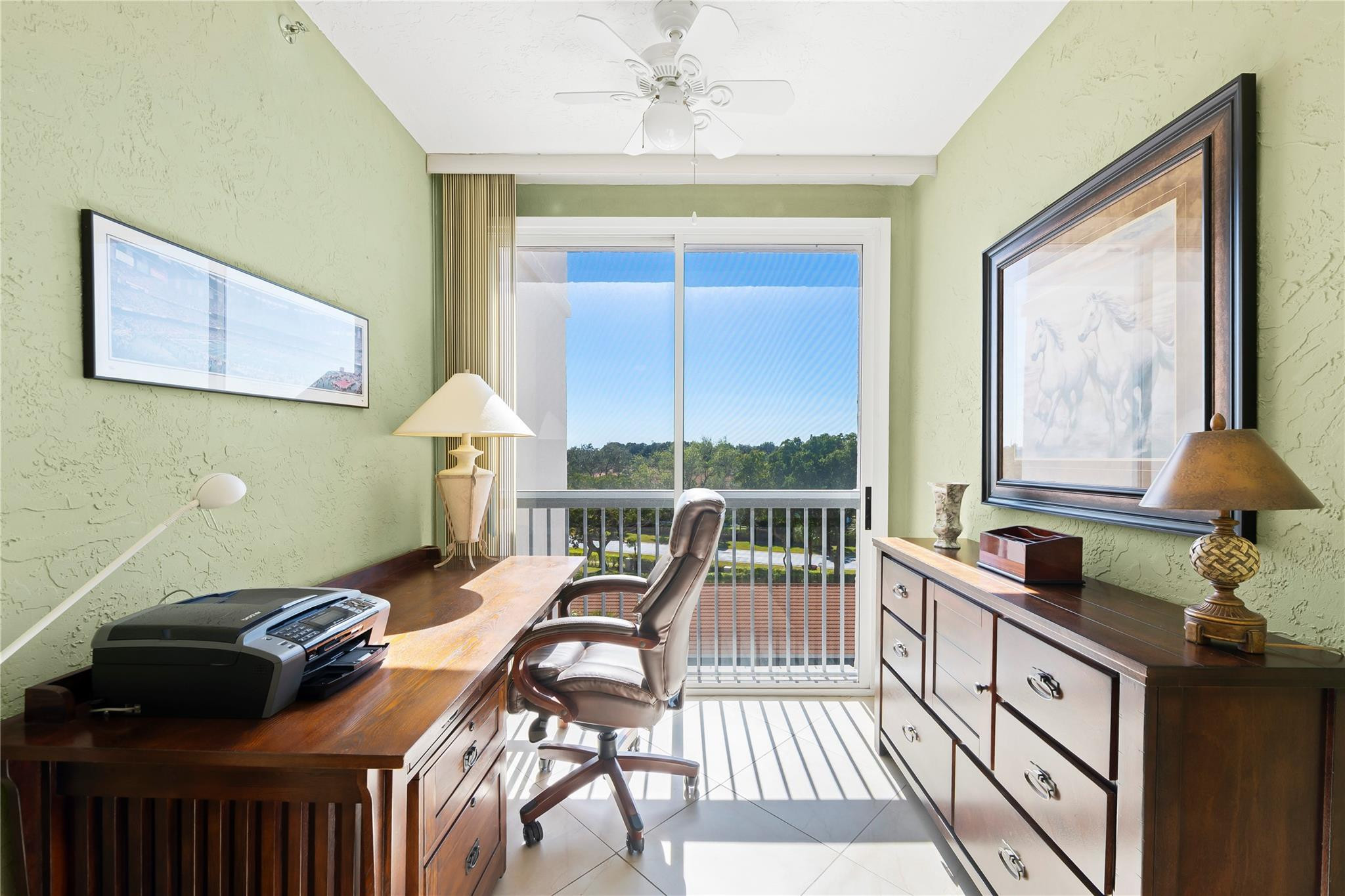 17031 Boca Club Boulevard, Unit 85A Boca Raton, FL 33487 - Photo 23 of 49 a living room with furniture and a window