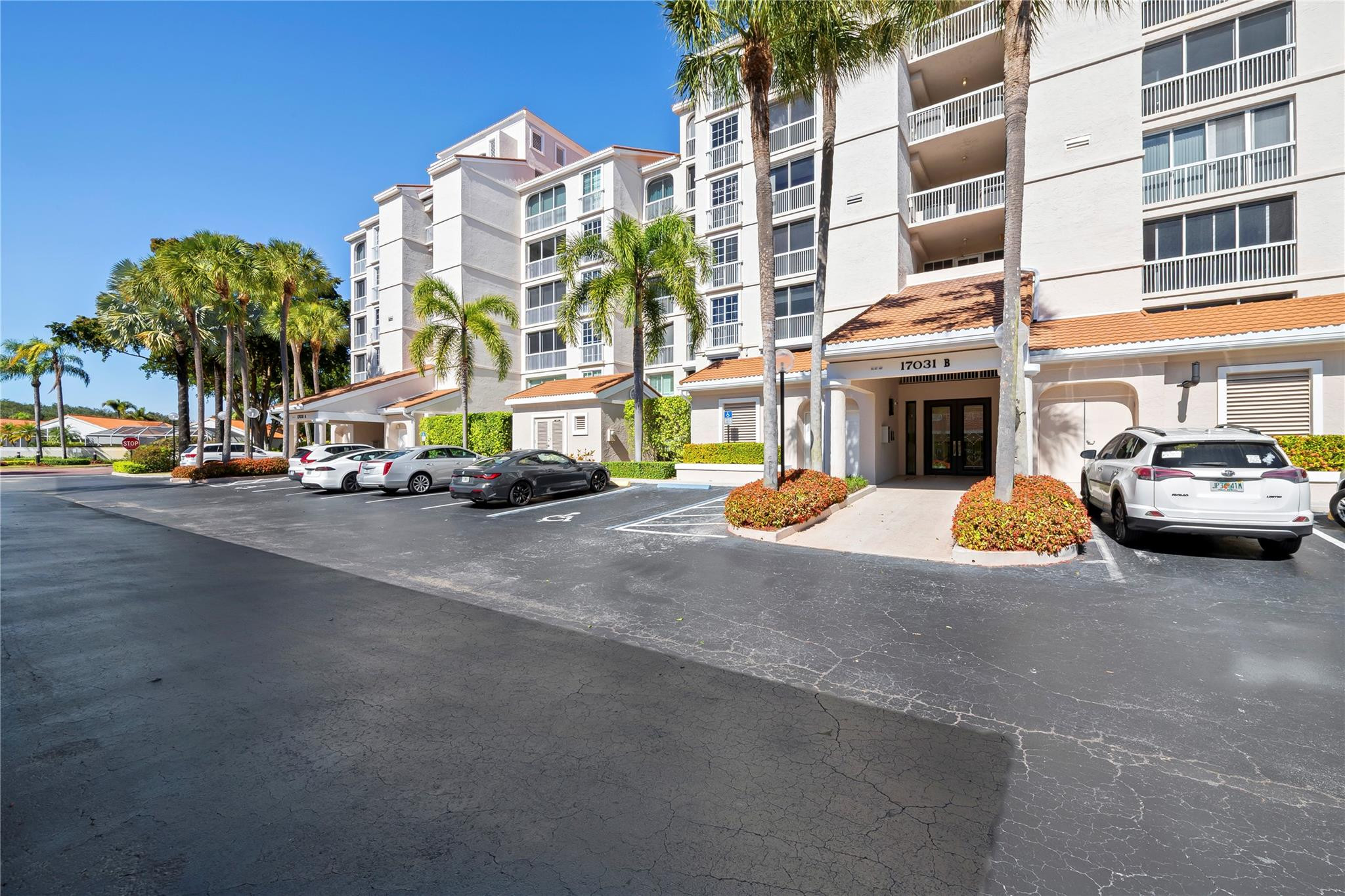 17031 Boca Club Boulevard, Unit 85A Boca Raton, FL 33487 - Photo 44 of 49 a view of a street with cars