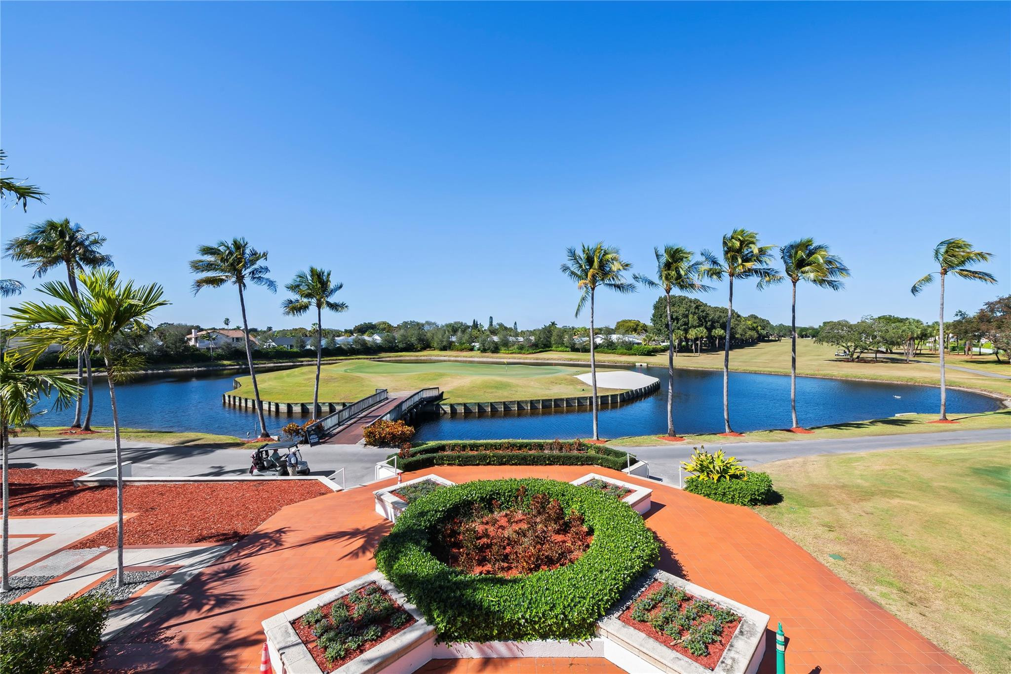 17031 Boca Club Boulevard, Unit 85A Boca Raton, FL 33487 - Photo 48 of 49 a view of a swimming pool with an outdoor seating
