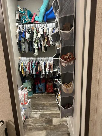 a room with lots of different colored cloths