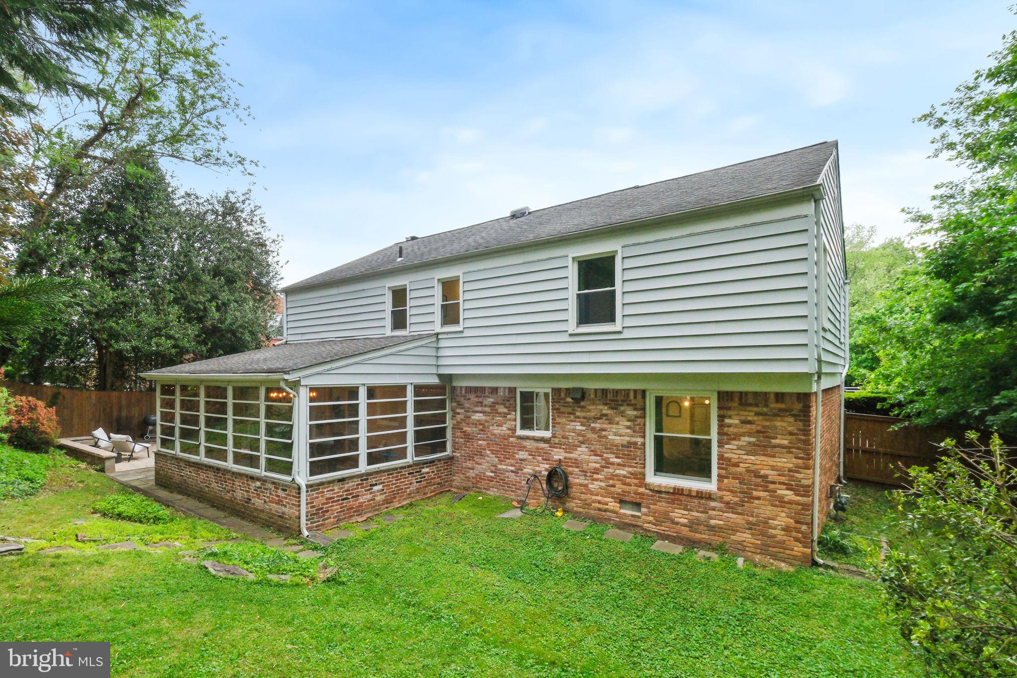 10900 Gainsborough Road Potomac, MD 20854 - Photo 42 of 44 a view of a house with a yard