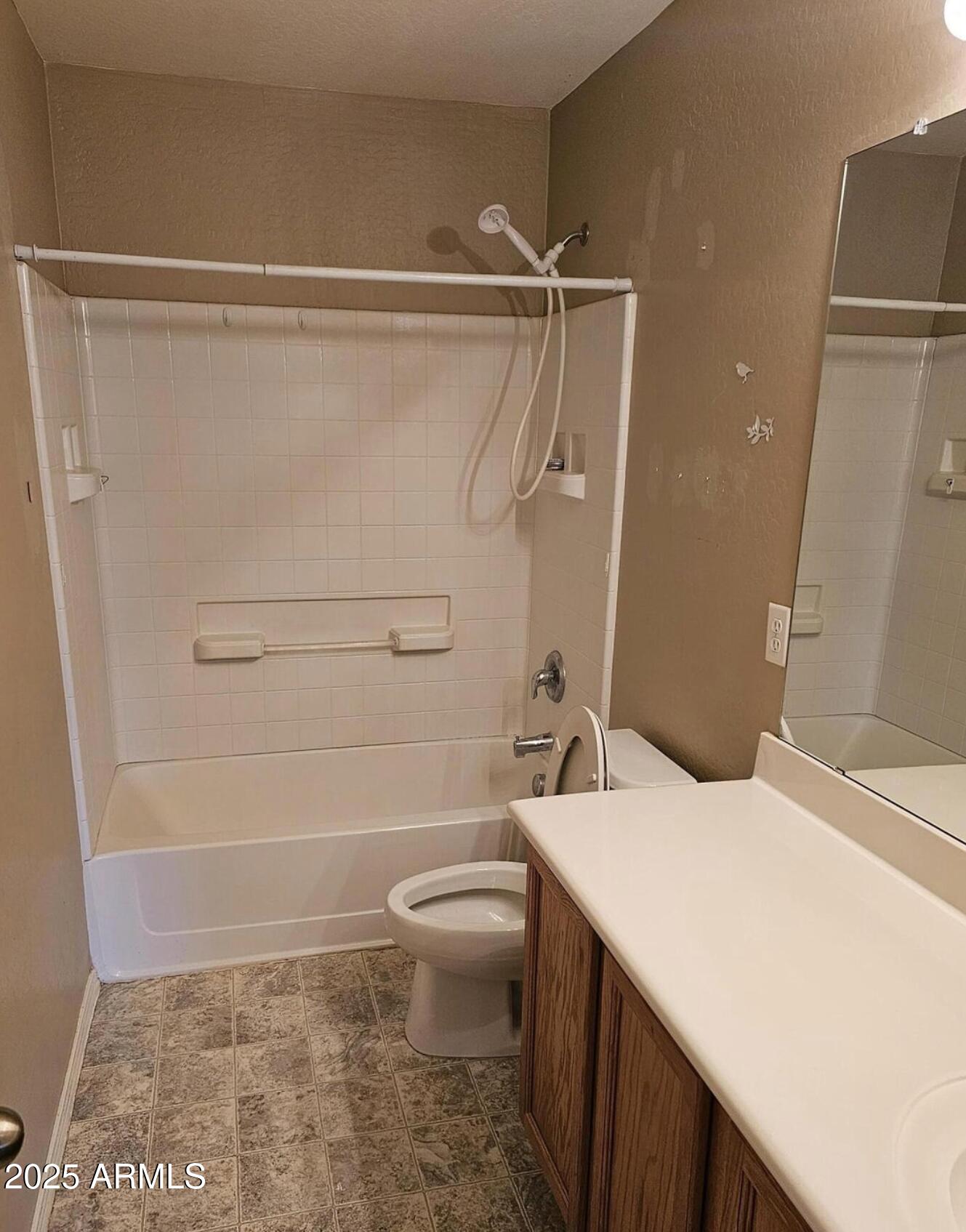 139 North Carter Ranch Road Coolidge, AZ 85128 - Photo 11 of 28 a bathroom with a sink a toilet and shower
