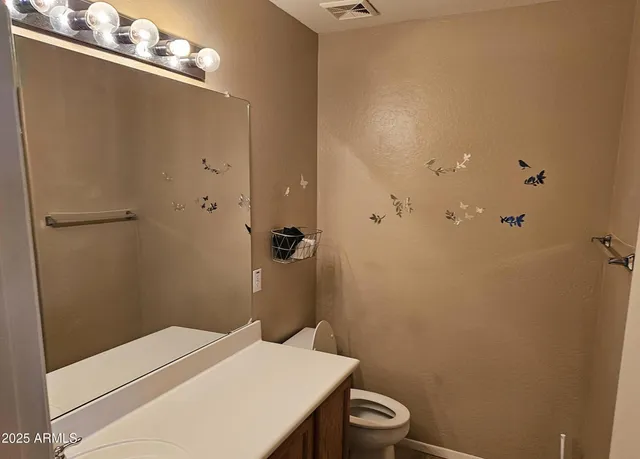 a bathroom with a sink and a toilet