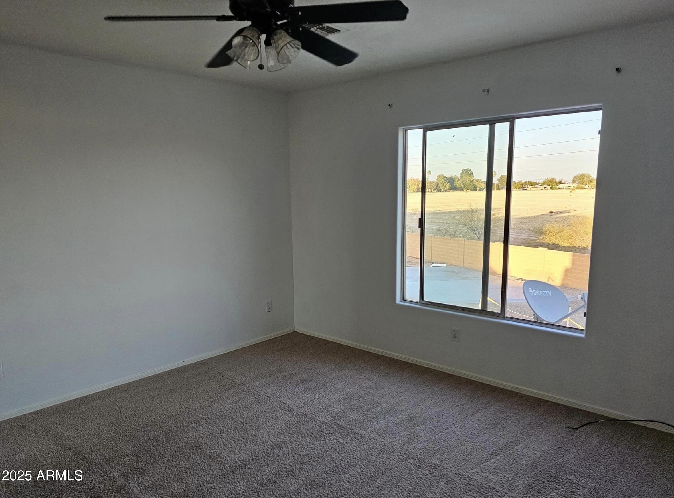 139 North Carter Ranch Road Coolidge, AZ 85128 - Photo 15 of 28 an empty room with a window