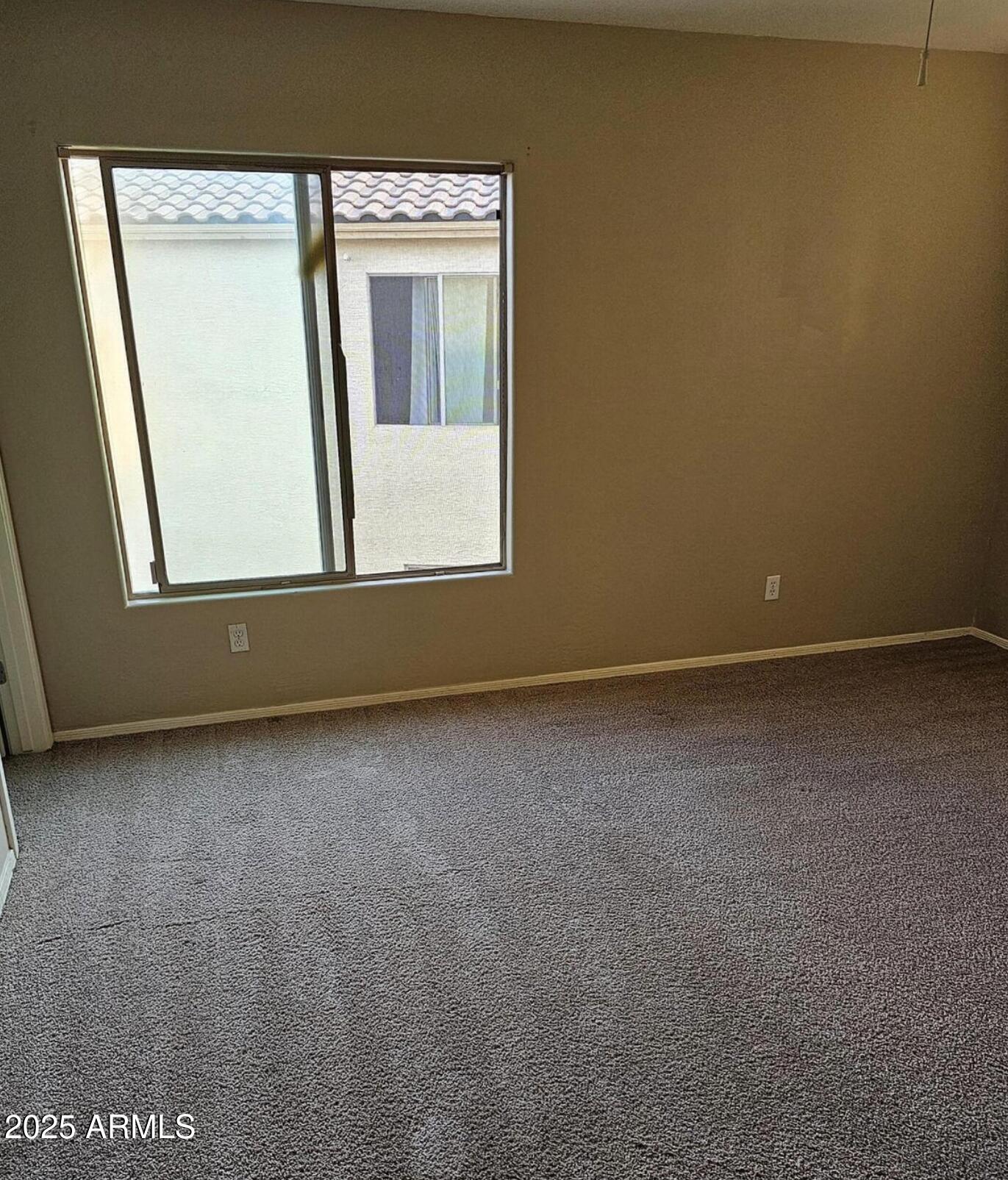 139 North Carter Ranch Road Coolidge, AZ 85128 - Photo 16 of 28 a view of a room that has a window in it