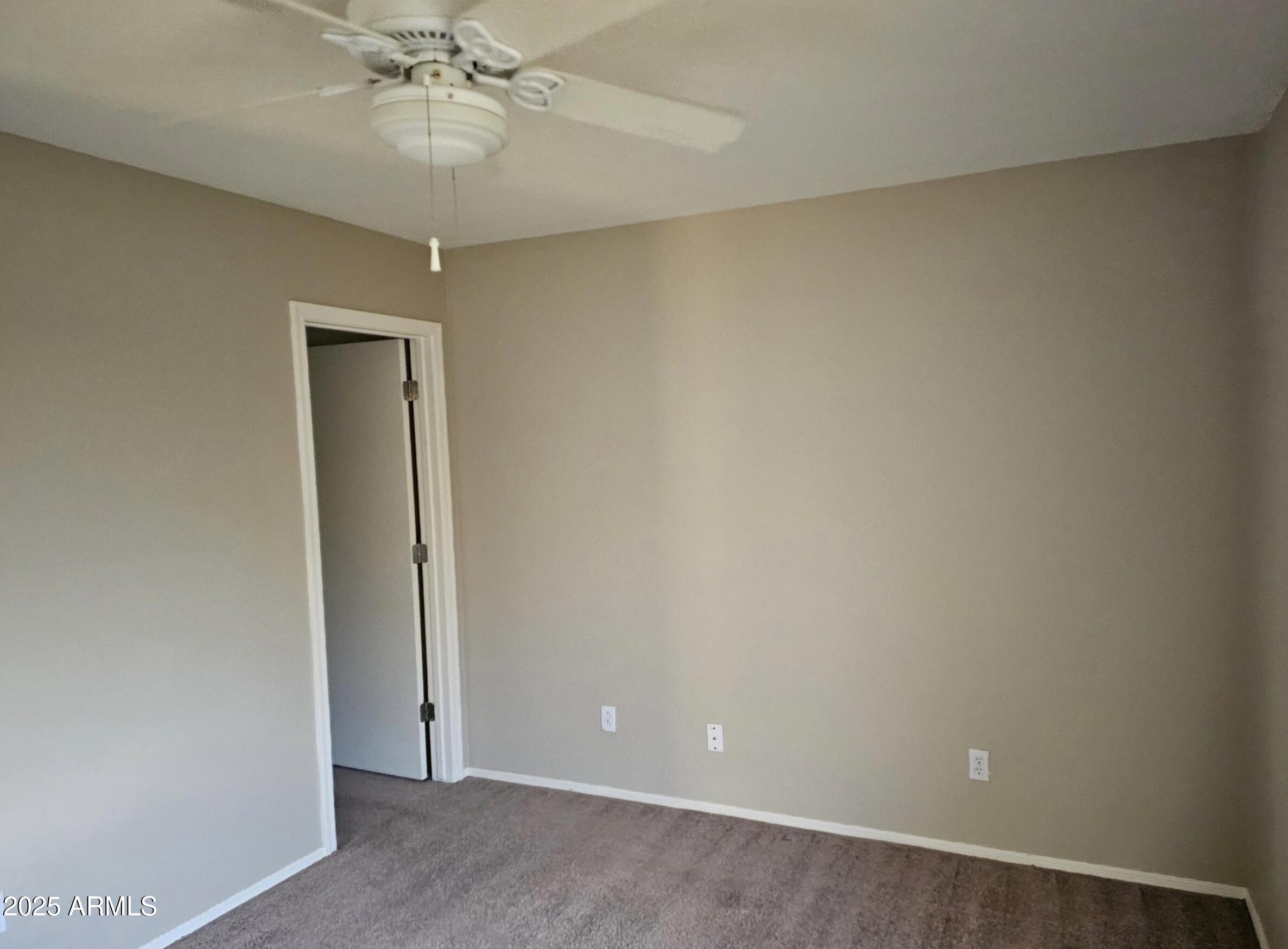 139 North Carter Ranch Road Coolidge, AZ 85128 - Photo 17 of 28 an empty room with a view of a bathroom