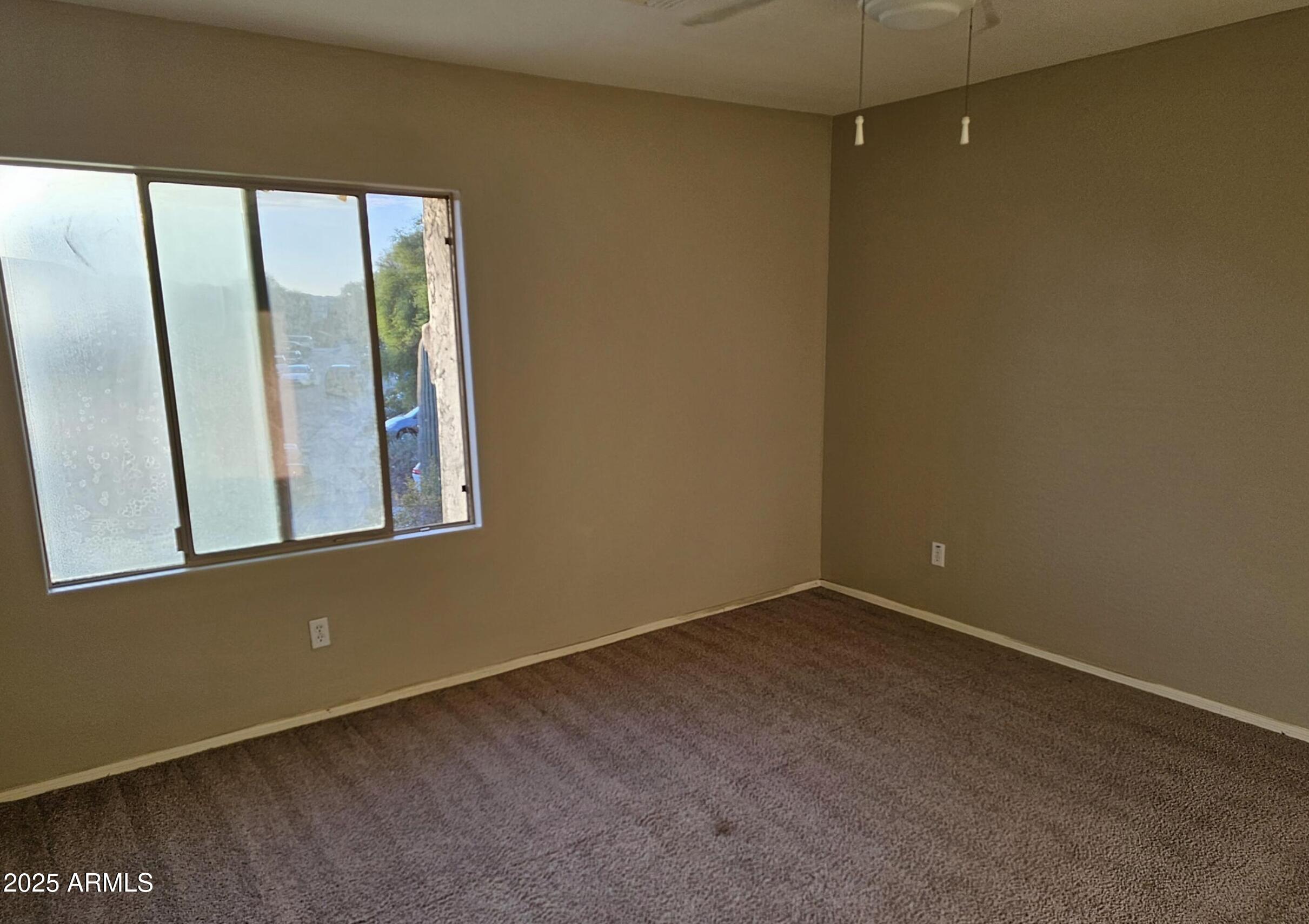 139 North Carter Ranch Road Coolidge, AZ 85128 - Photo 20 of 28 a view of an empty room with a window