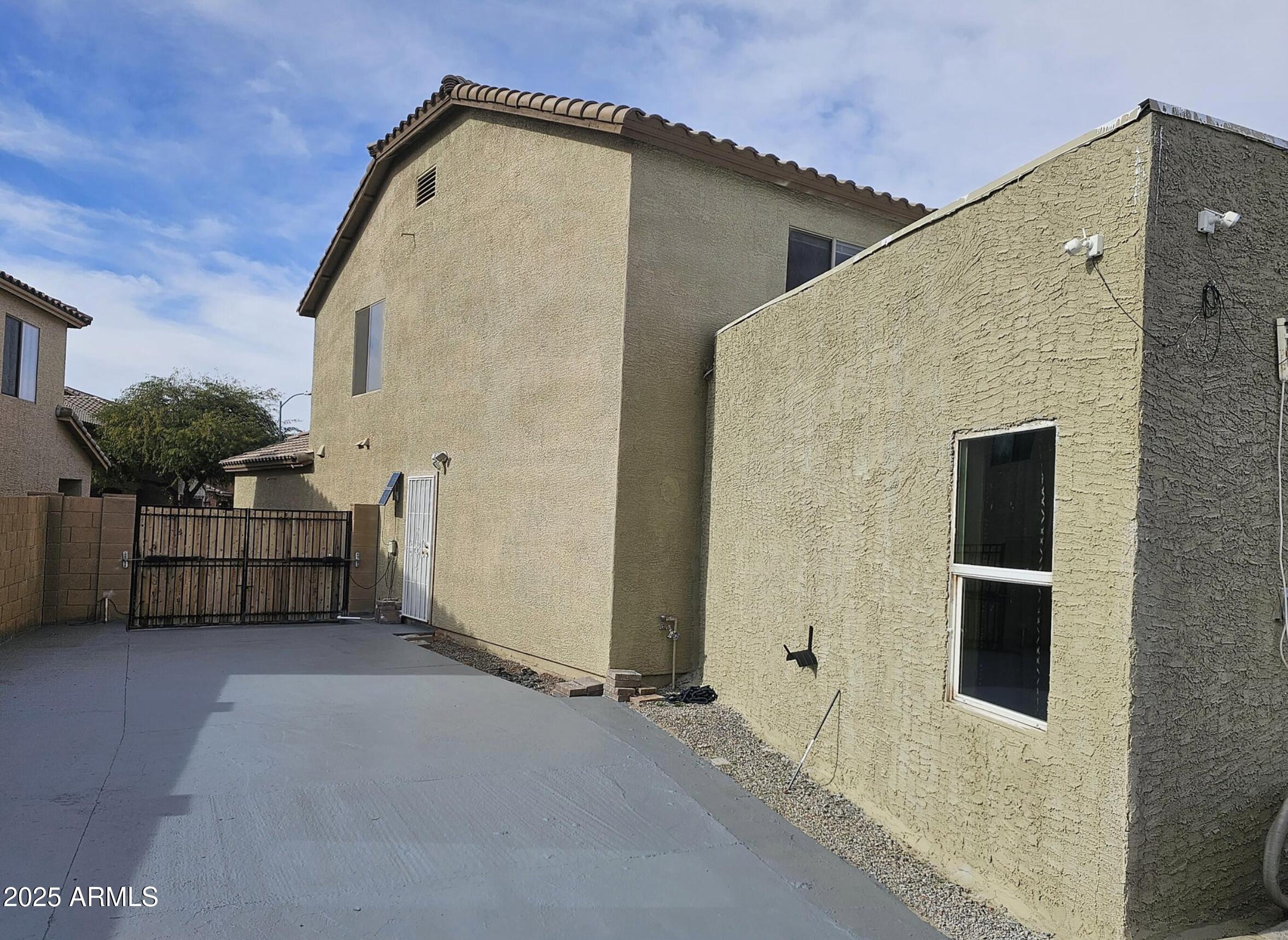 139 North Carter Ranch Road Coolidge, AZ 85128 - Photo 27 of 28 a view of a house with a outdoor space
