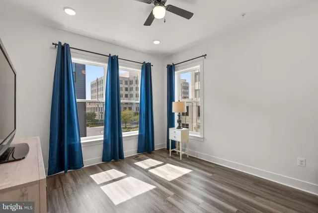 a room with furniture and flat screen tv