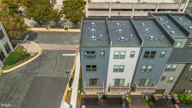 a view of a street with sitting area