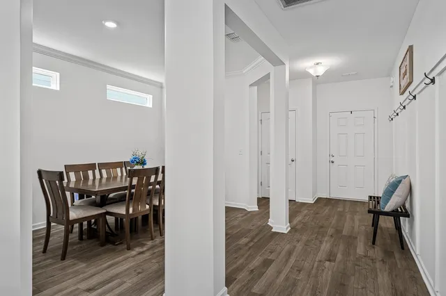 a living room with furniture fireplace and flat screen tv