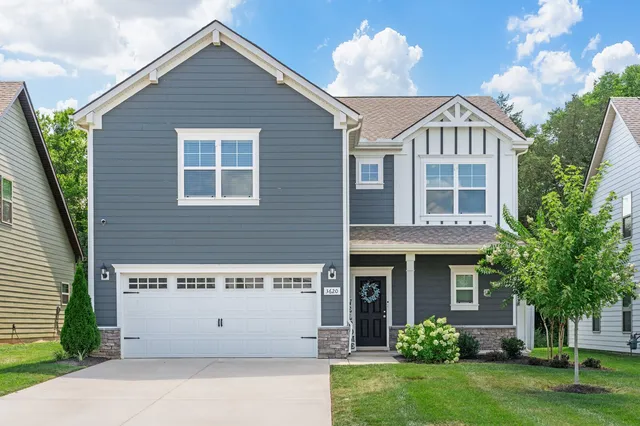 an aerial view of a house with garden space