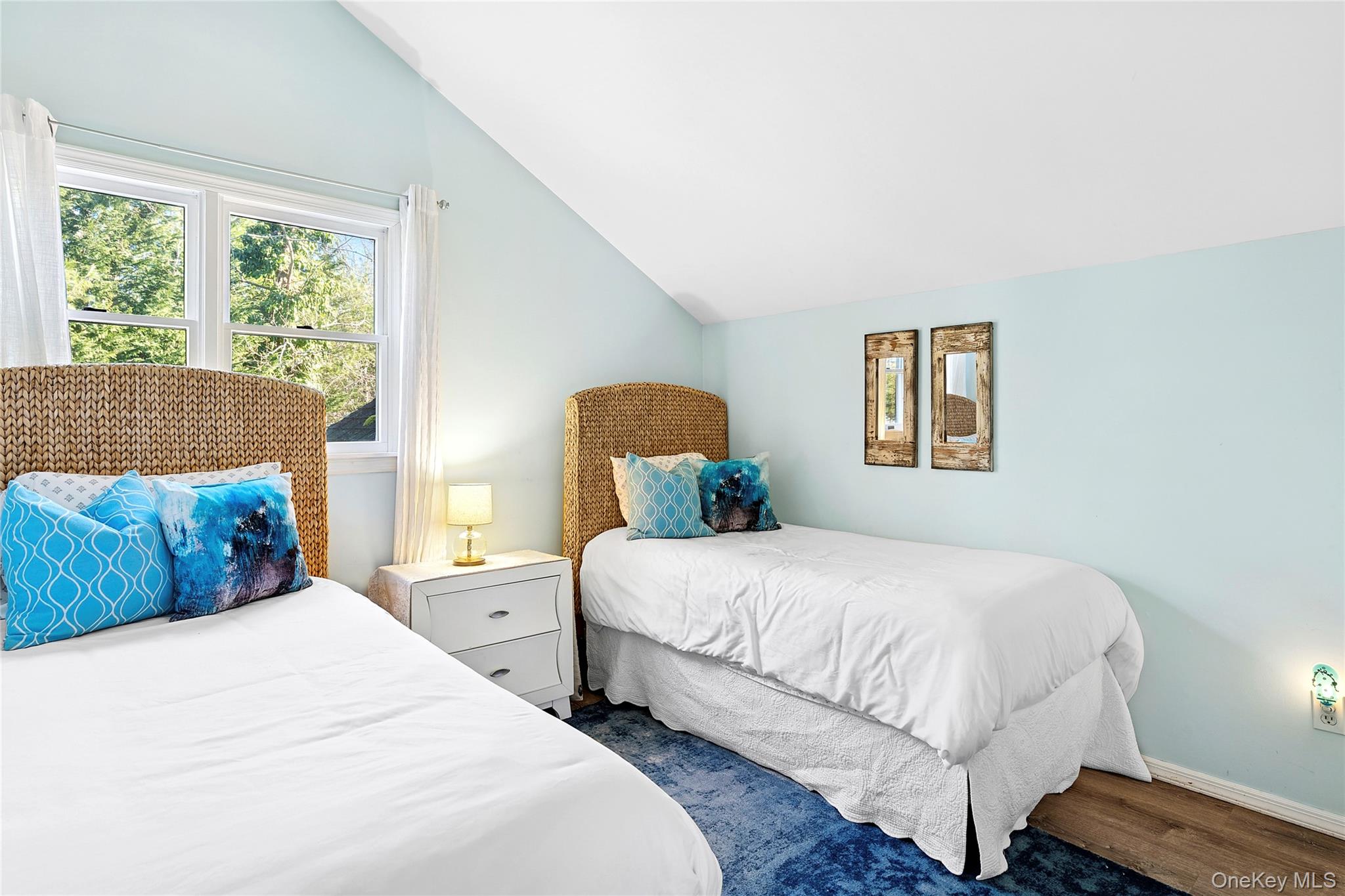 364 Three Mile Harbor Road East Hampton, NY 11937 - Photo 15 of 18 a bedroom with a bed and wooden floor