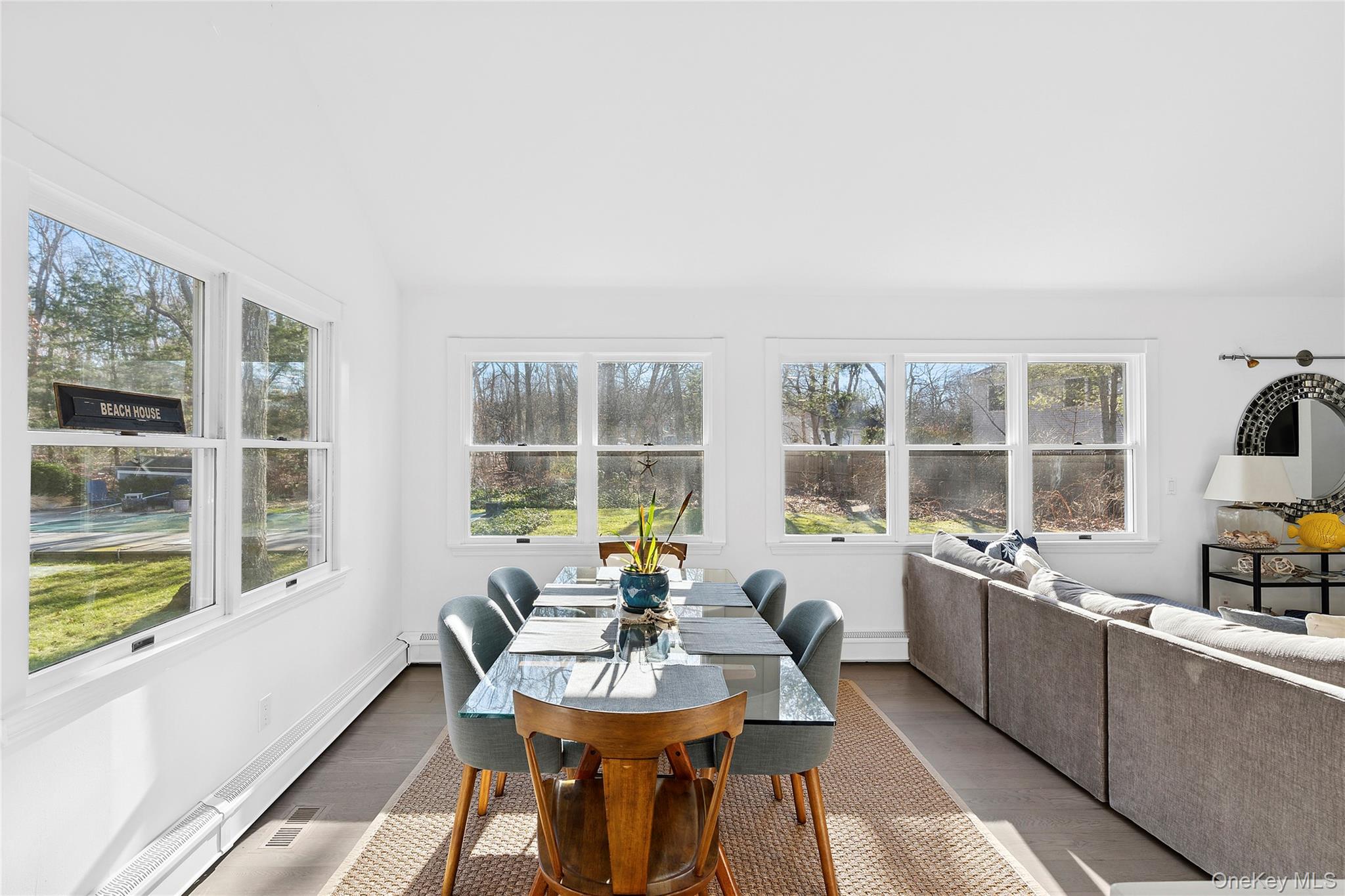 364 Three Mile Harbor Road East Hampton, NY 11937 - Photo 10 of 18 a view of a dining room with furniture window and outside view