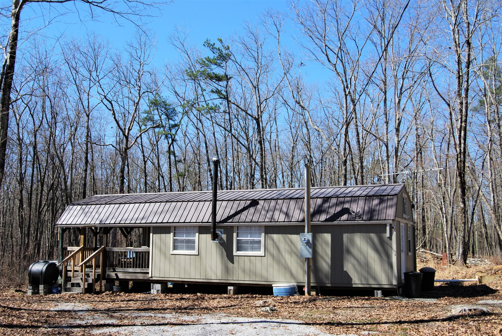 1415 Log Road Spring City, TN 37381 - Photo 1 of 34 a front view of a house