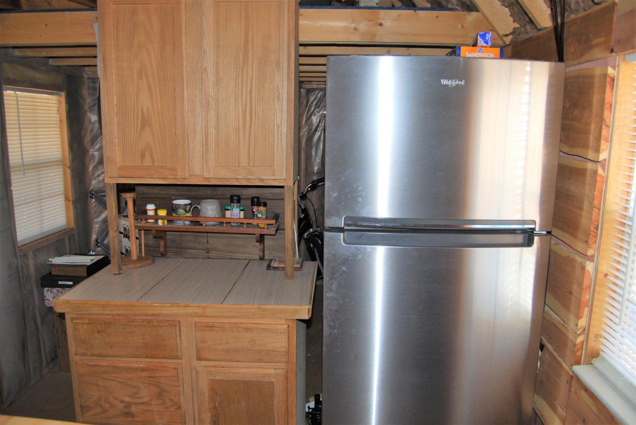1415 Log Road Spring City, TN 37381 - Photo 17 of 34 a kitchen with a refrigerator and a sink