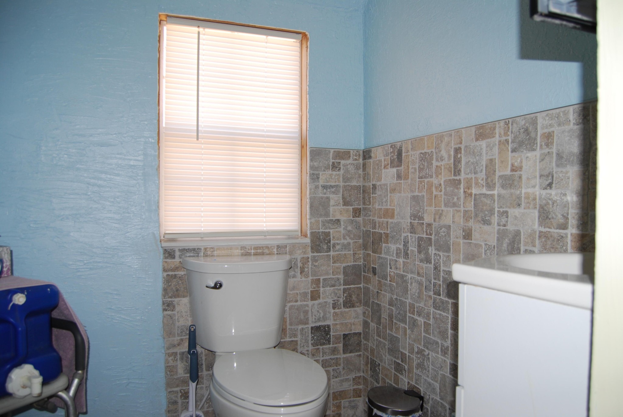 1415 Log Road Spring City, TN 37381 - Photo 28 of 34 a bathroom with a toilet a sink and a window