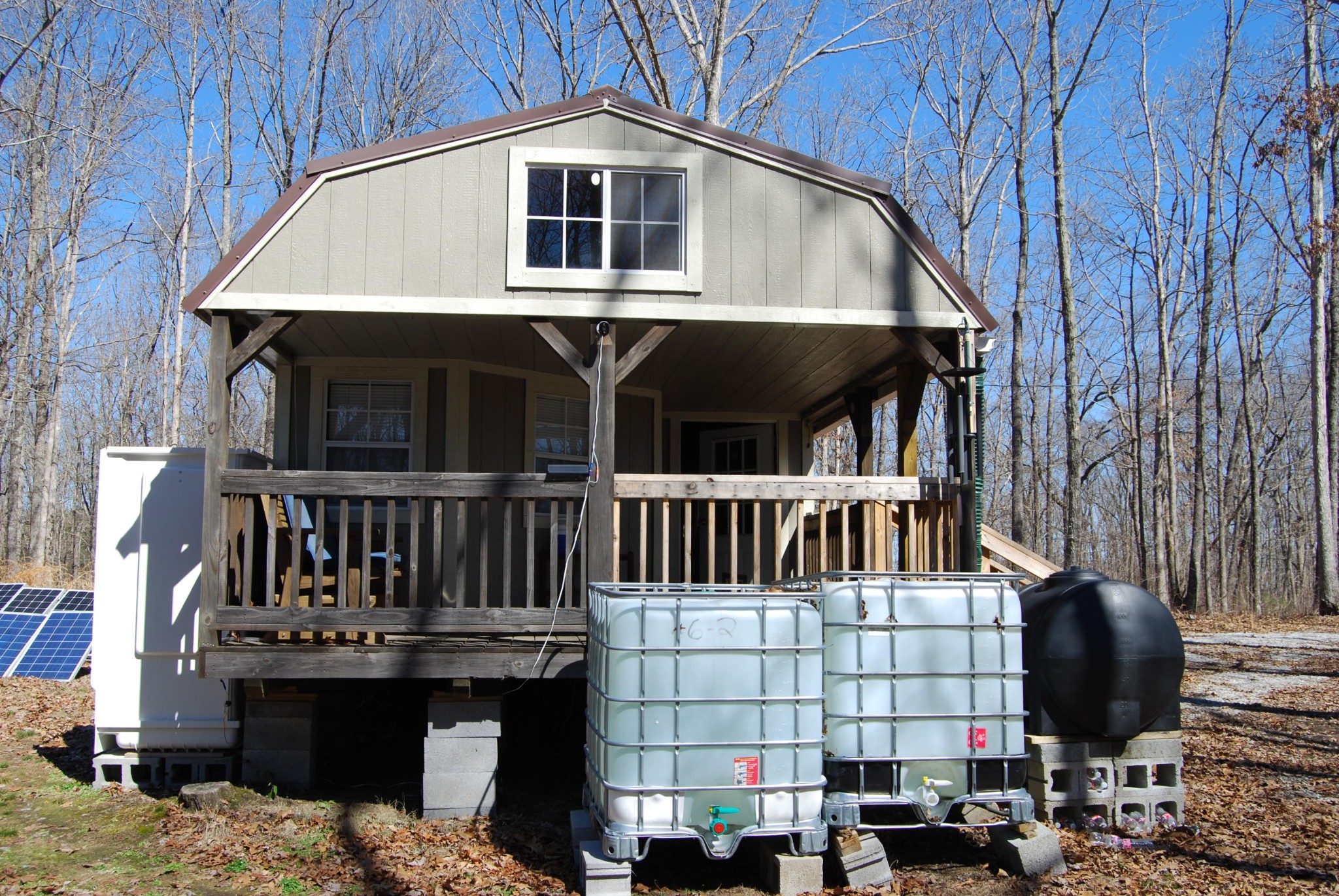 1415 Log Road Spring City, TN 37381 - Photo 9 of 34 a front view of a house with a balcony