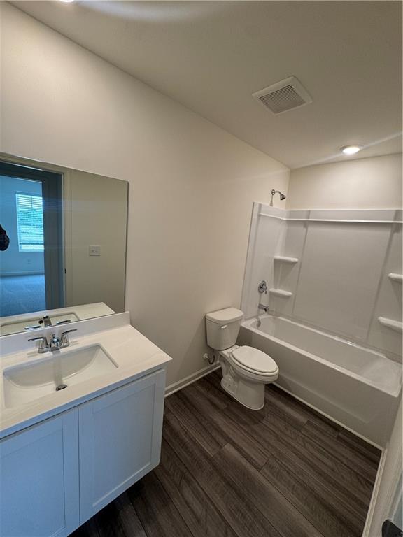 417 Towson Street Villa Rica, GA 30180 - Photo 8 of 18 a bathroom with a sink a toilet and shower