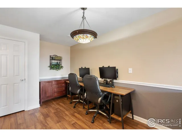 a view of a workspace with furniture