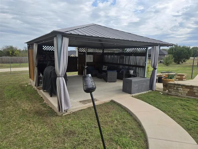 a vase of flowers sitting on a table
