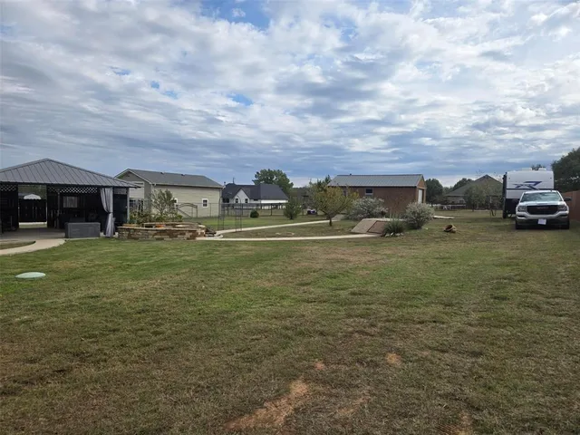 a view of a house with a garden