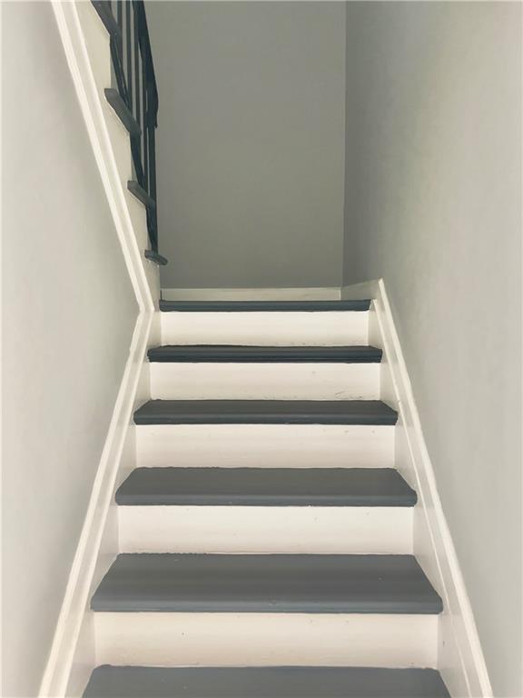 3781 Martin Luther King Junior Drive Southwest Atlanta, GA 30331 - Photo 7 of 13 a view of staircase with white walls
