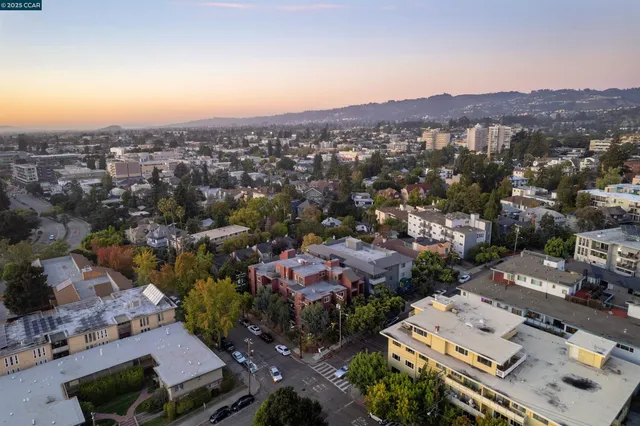 an aerial view of a city with lots of residential buildings