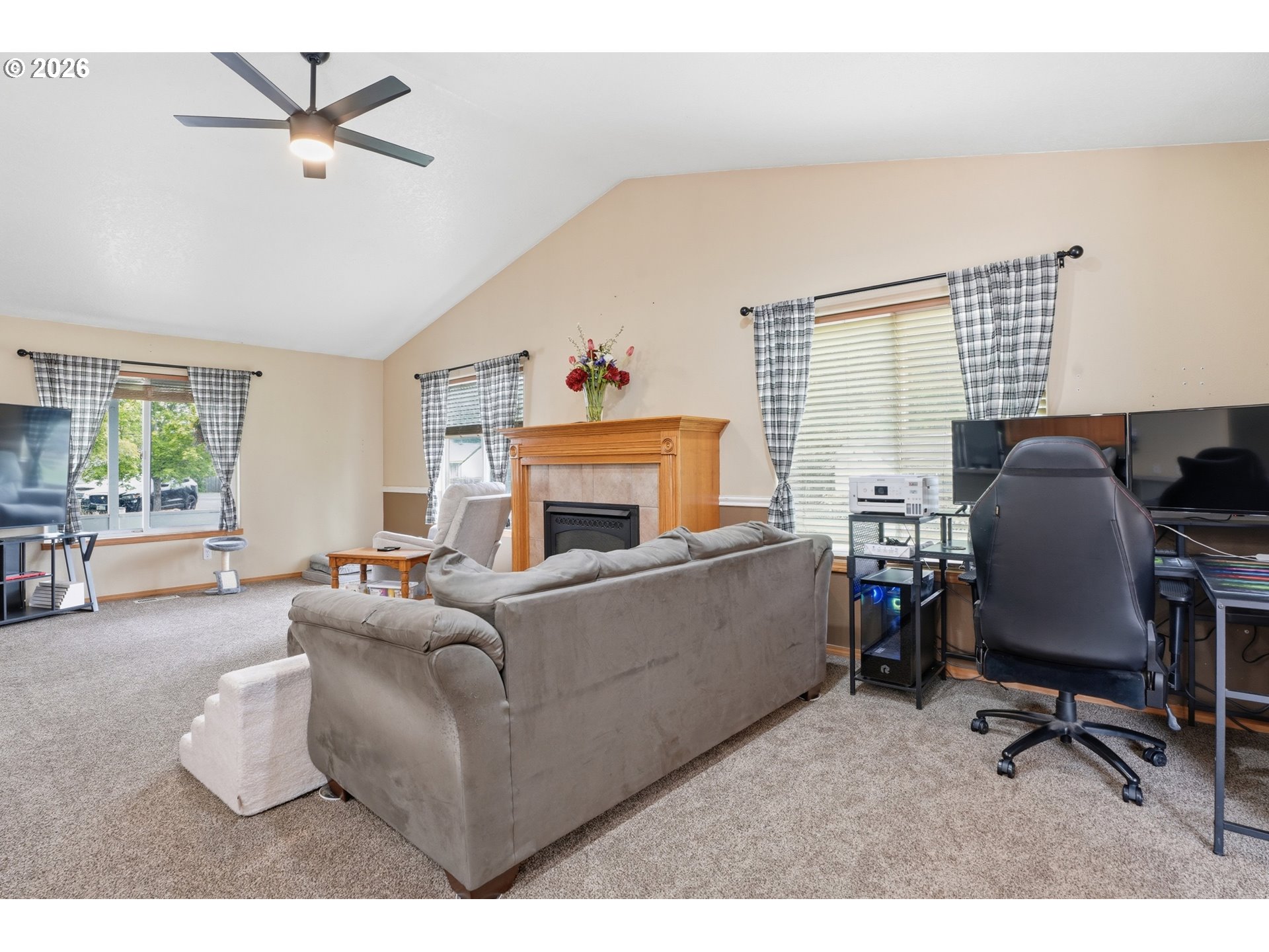 105 Toliver Road Molalla, OR 97038 - Photo 8 of 34 a living room with furniture and a fireplace