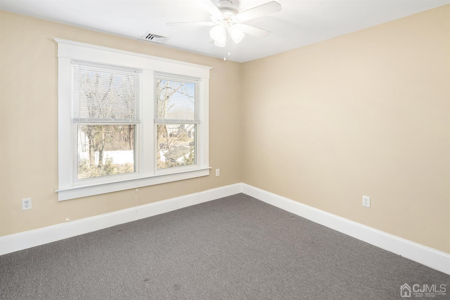 618 Ridge Road Monmouth Junction, NJ 08852 - Photo 12 of 18 an empty room with a window