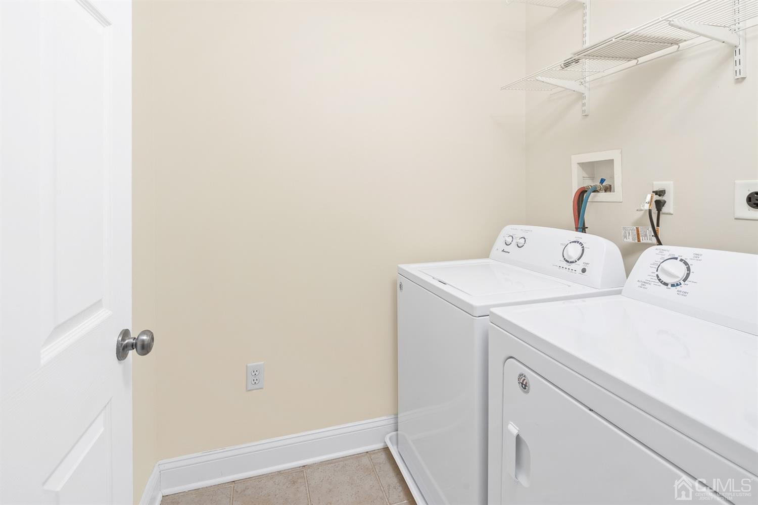 618 Ridge Road Monmouth Junction, NJ 08852 - Photo 15 of 18 a utility room with dryer and washer
