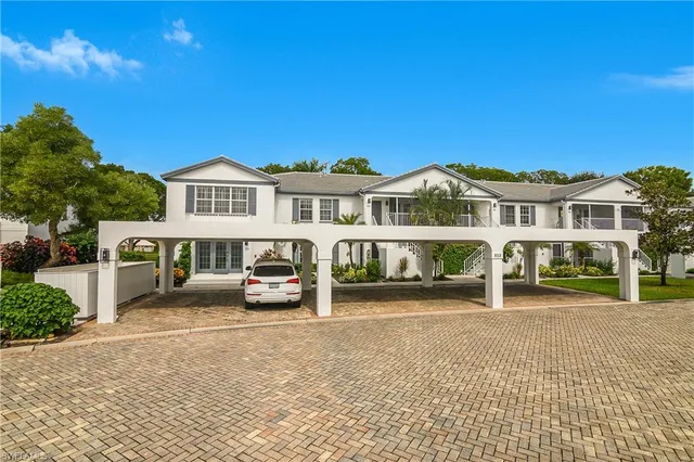 a view of a car park in front of a building
