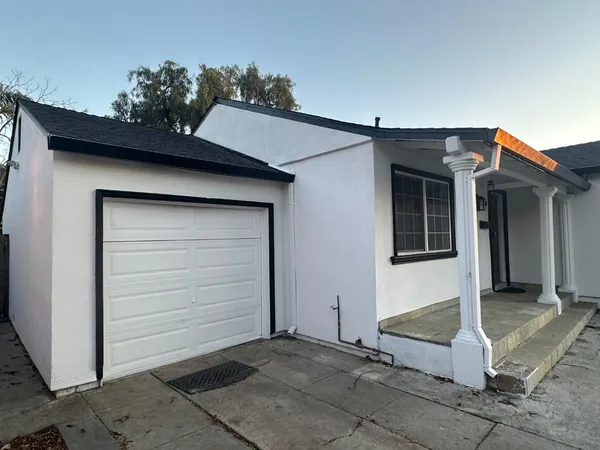 a view of a house with a garage