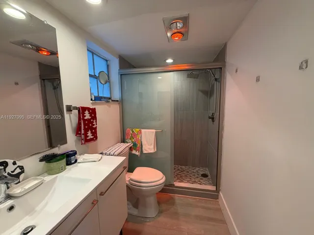 a view of a balcony with furniture