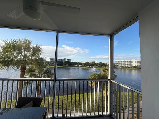 a bathroom with a sink a stove and a window