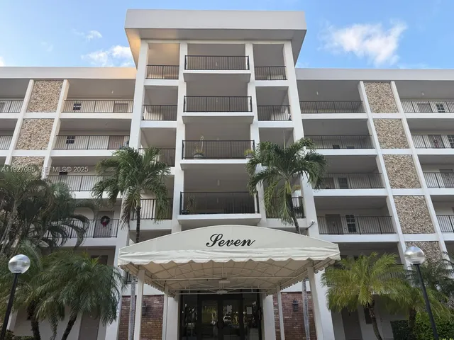 a view of an ocean house and a yard