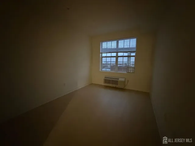 a view of a room that has a window in it