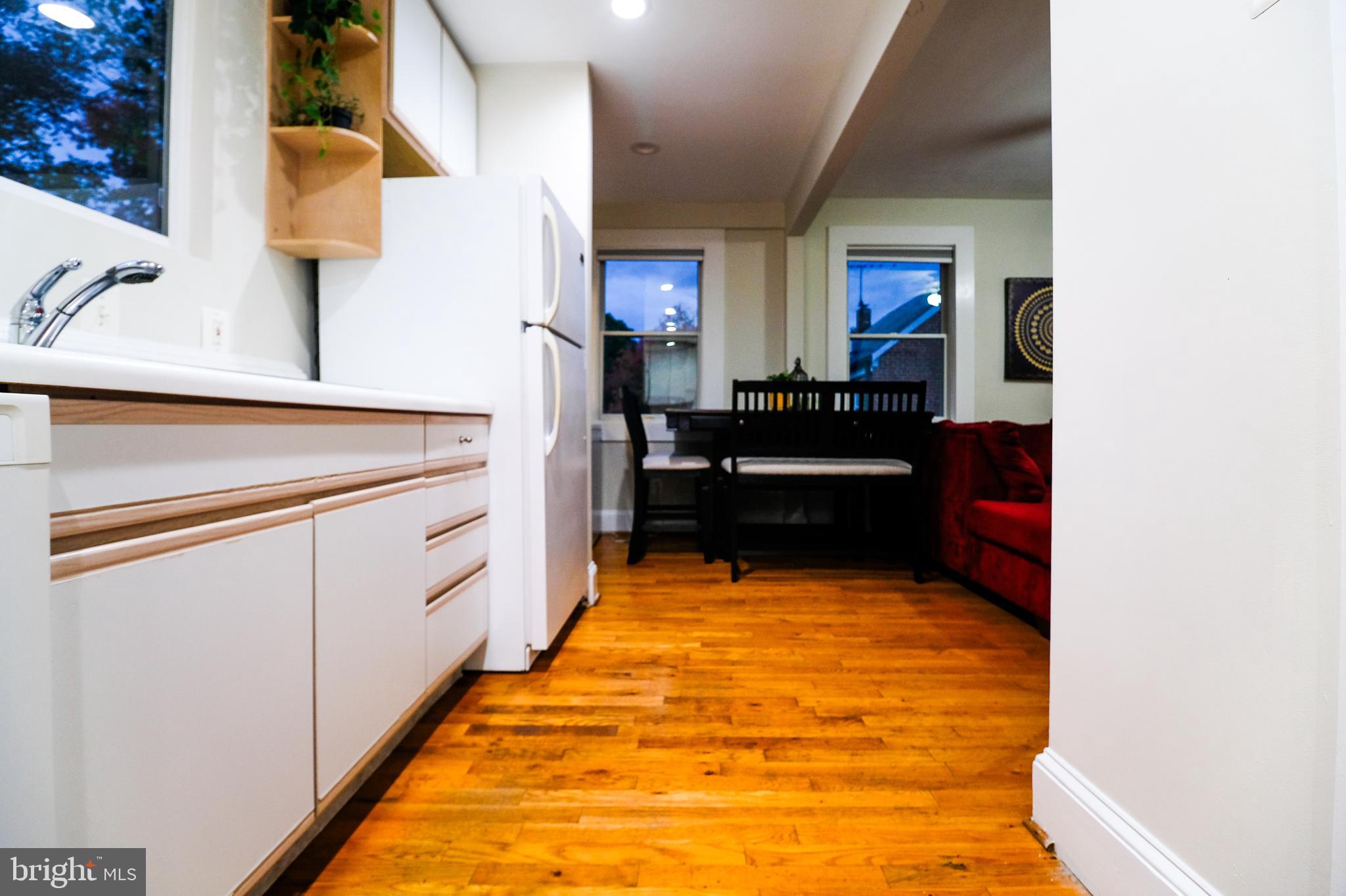 905 Woodsdale Road Catonsville, MD 21228 - Photo 8 of 23 a bathroom with a sink and a mirror