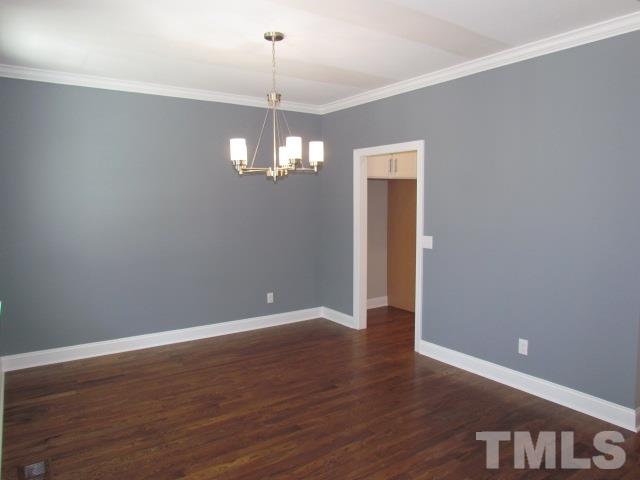 1628 Forest Road Wake Forest, NC 27587 - Photo 4 of 25 Opening in dining room leads to kitchen.