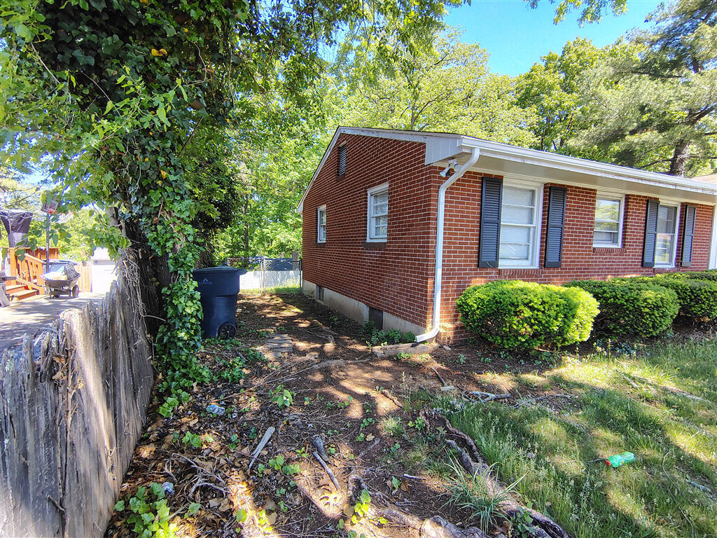 5031 Showalter Road Northwest Roanoke, VA 24017 - Photo 16 of 21 a view of a house with a yard