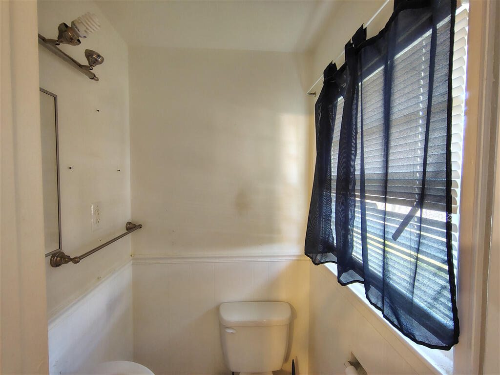 5031 Showalter Road Northwest Roanoke, VA 24017 - Photo 5 of 21 a bathroom with a toilet and shower