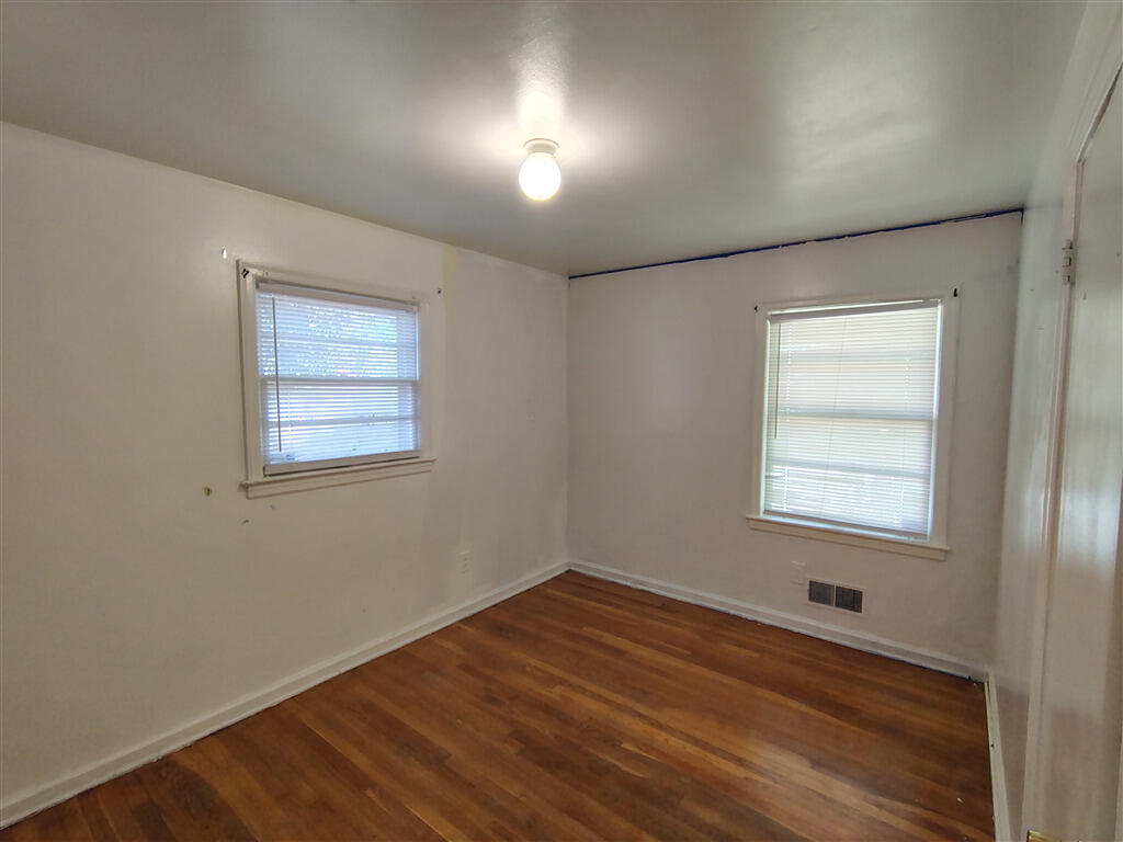 5031 Showalter Road Northwest Roanoke, VA 24017 - Photo 6 of 21 an empty room with a window