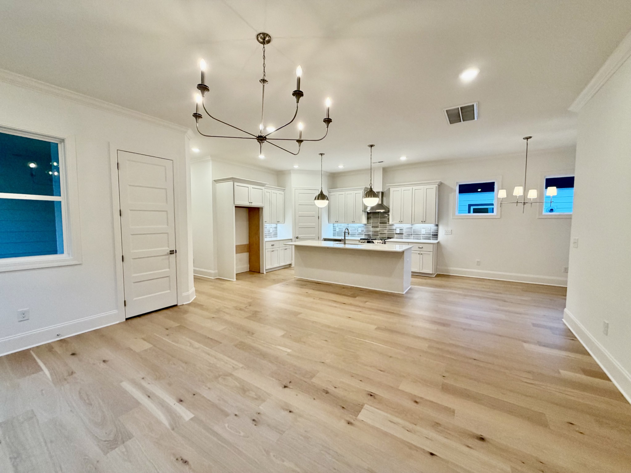 7137 Frances Street Fairview, TN 37062 - Photo 24 of 64 a view of a kitchen with a stove cabinets and wooden floor