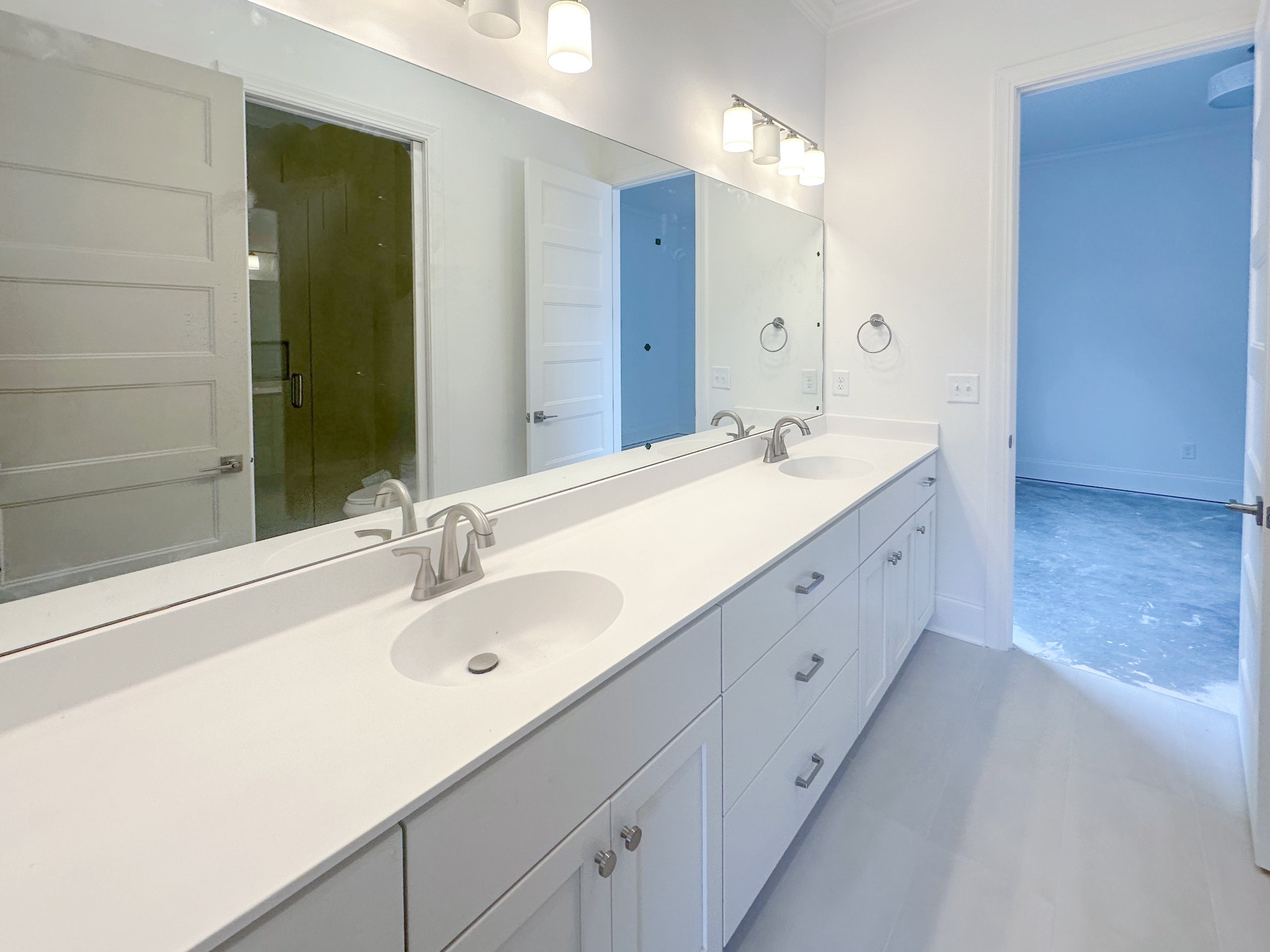 7137 Frances Street Fairview, TN 37062 - Photo 40 of 64 a bathroom with a double vanity sink and mirror