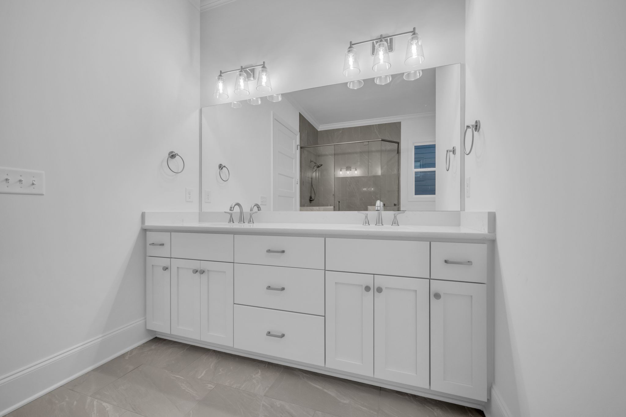 7137 Frances Street Fairview, TN 37062 - Photo 49 of 64 a bathroom with double sink and a mirror